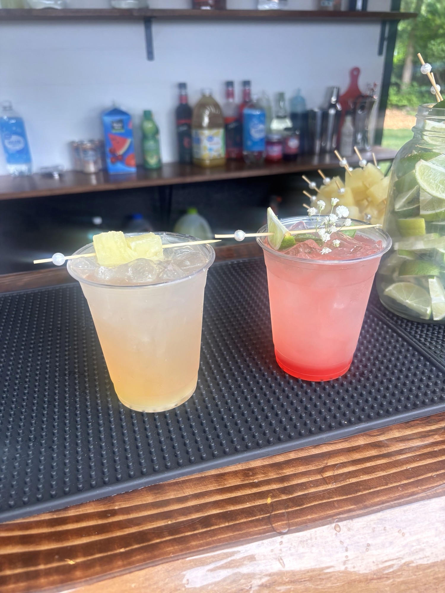 Two drinks on a bar counter